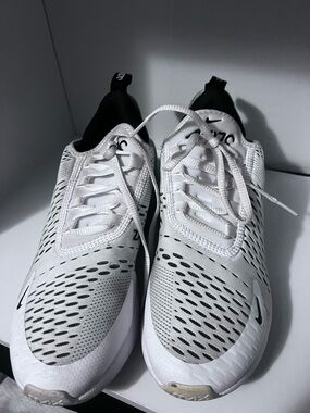 Women’s White Nike and Black Air Zoom Running Shoes
